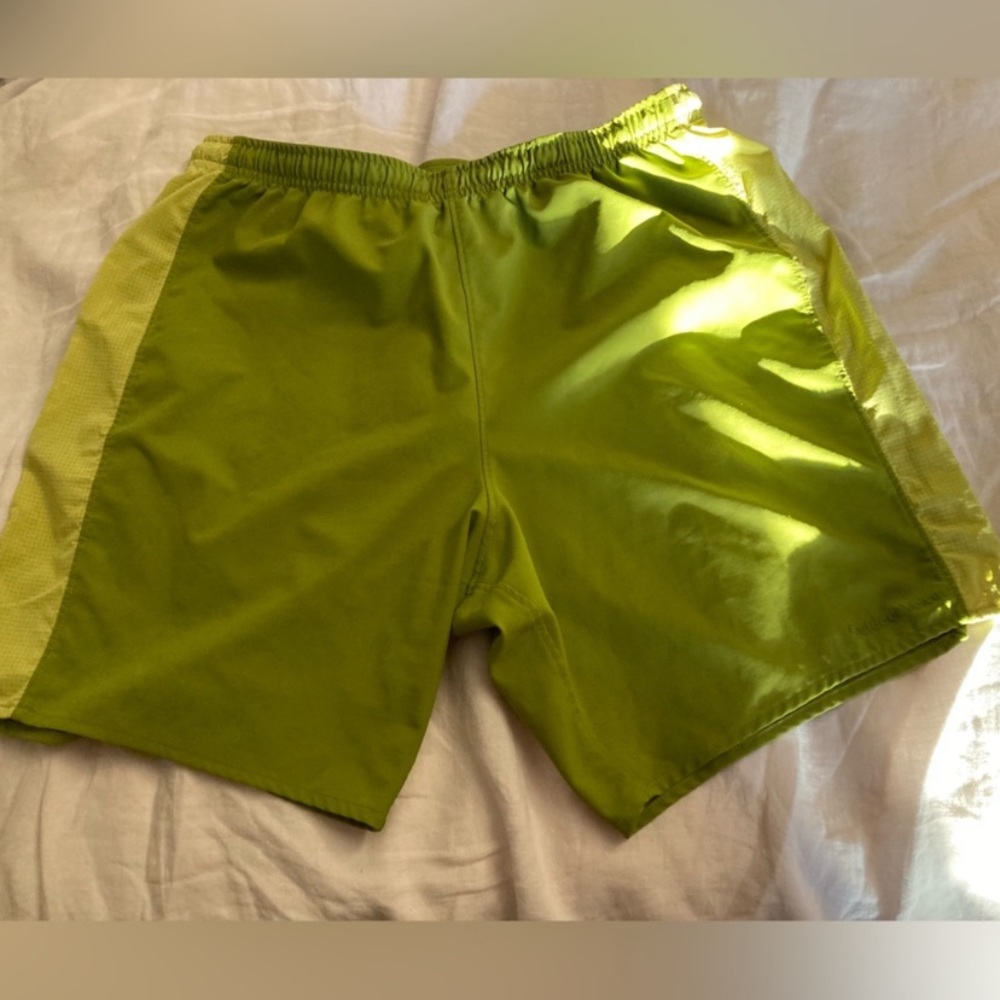 Mossy green outdoor voices stride shorts. Size M